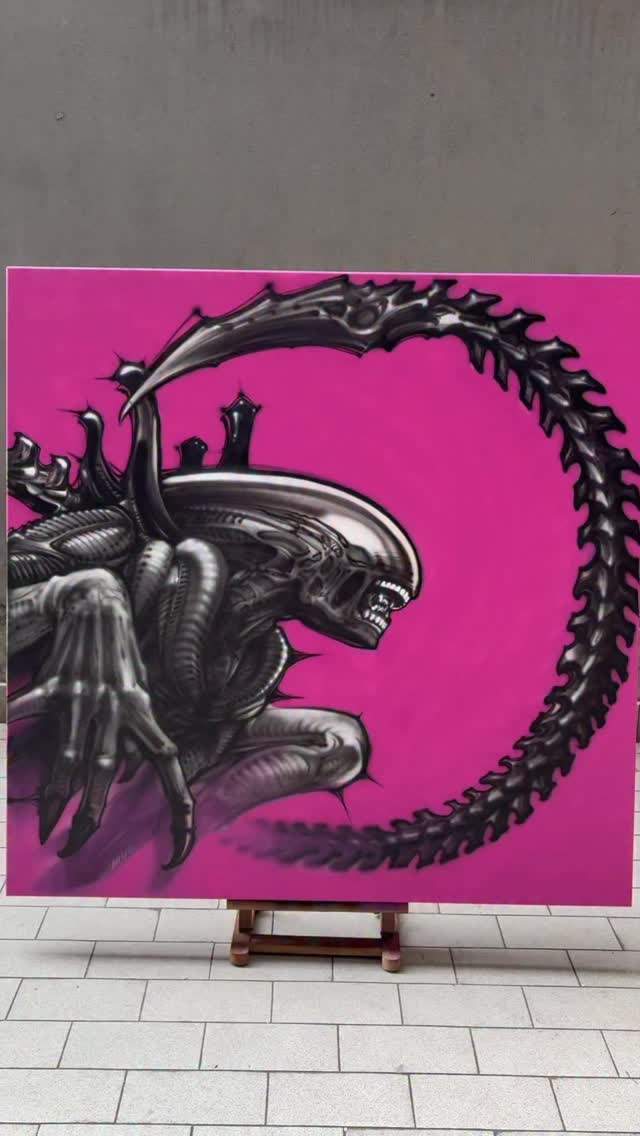 Large canvas painting featuring a biomechanical alien creature in profile with elongated head and spiky tail against a bright magenta background.