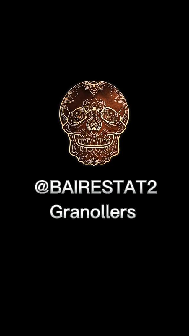 Ornate skull with decorative floral and geometric patterns in gold and brown tones on black background, credited to @bairestat2 Granollers.