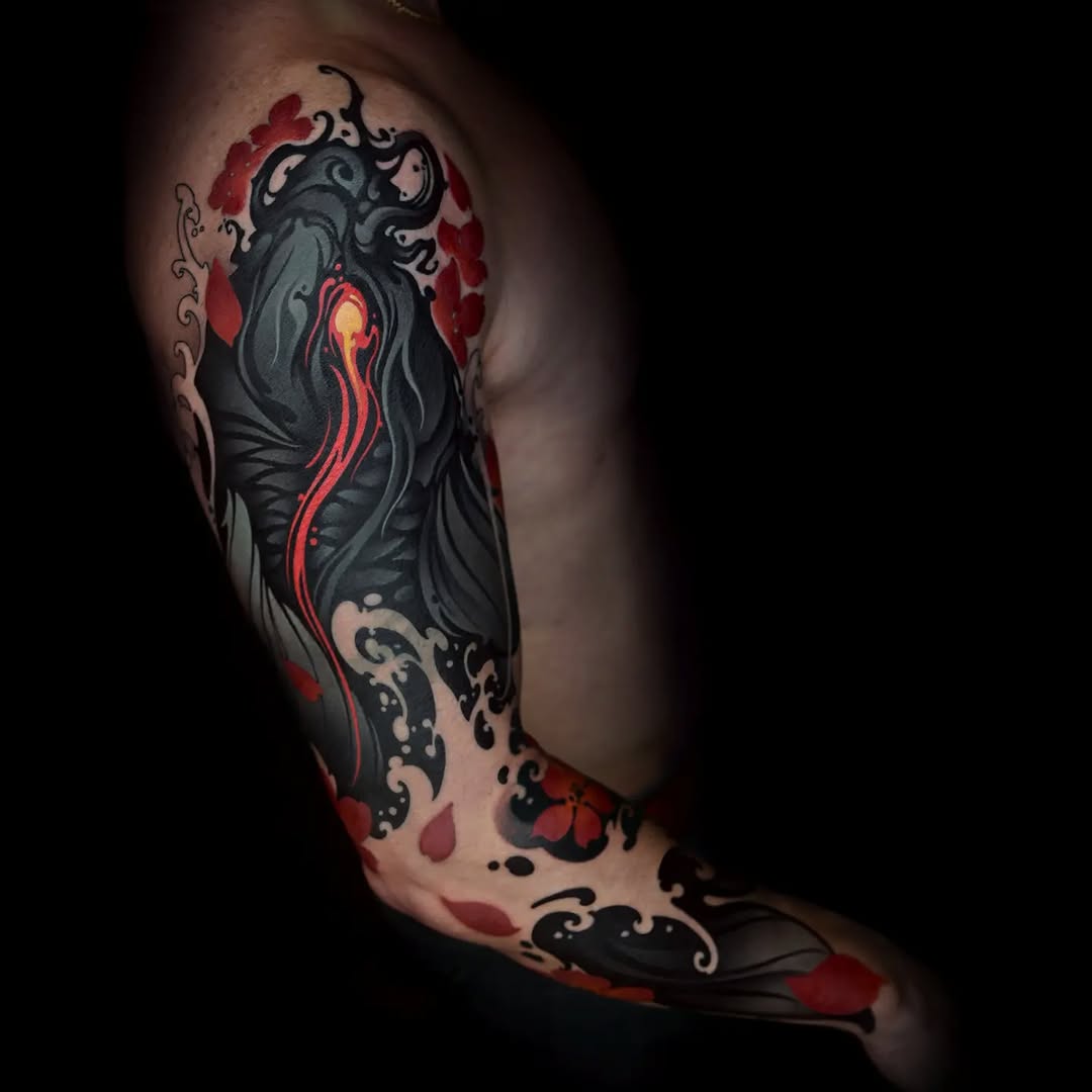 Full-leg sleeve tattoo featuring a dark horned figure with glowing red energy, surrounded by red floral elements and ornamental black scrollwork on the calf and thigh.