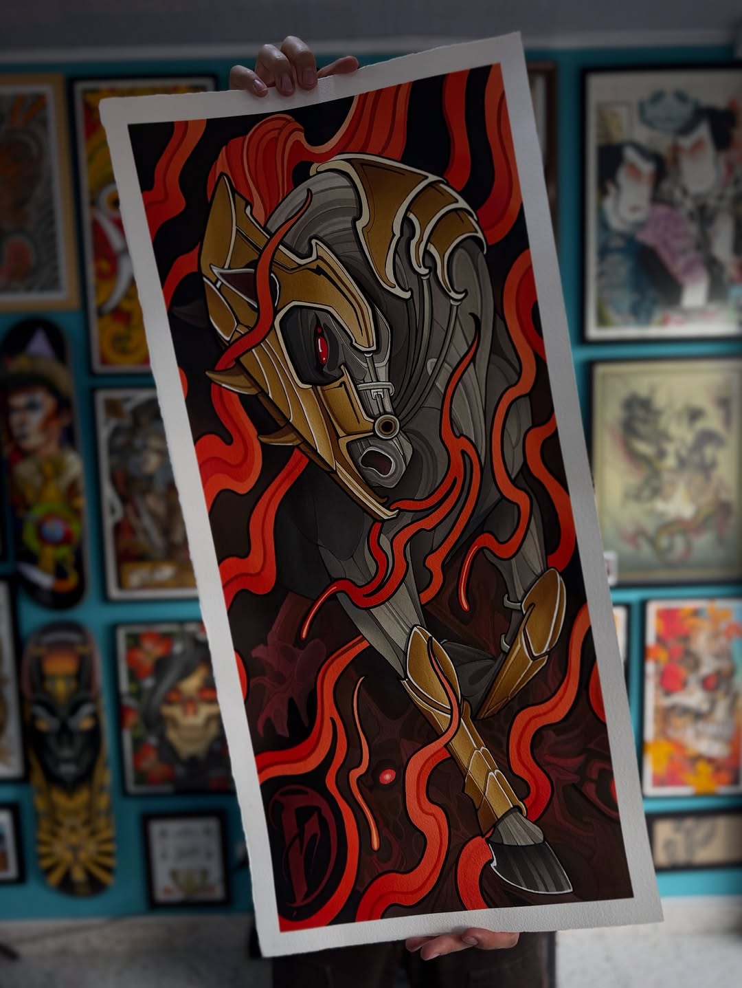 Tattoo design featuring a mechanical skull with bronze and gold plating, glowing red eye, and ornate details surrounded by red and black flame motifs on dark background.