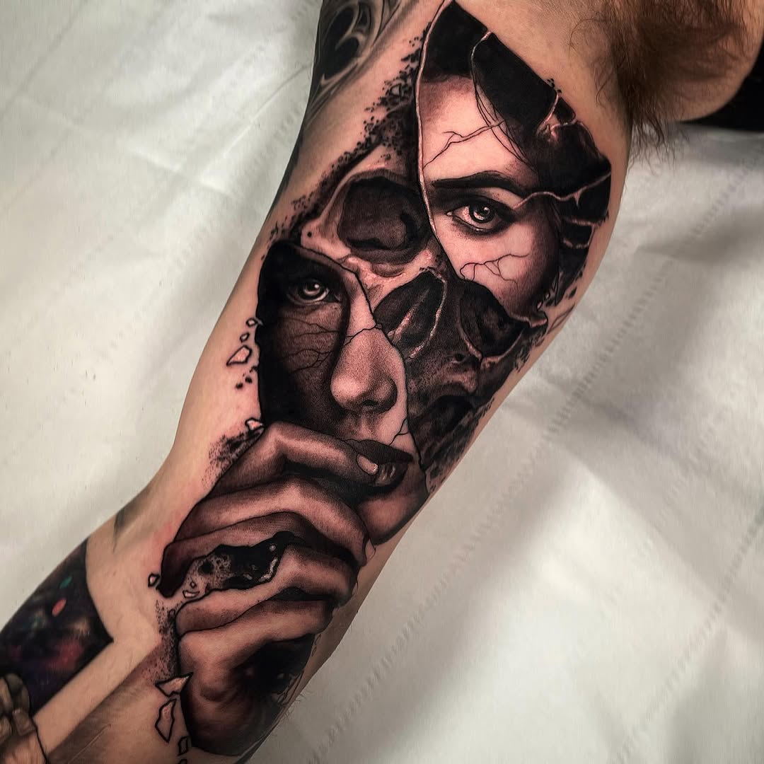 Forearm tattoo featuring stacked portrait faces with detailed shading and line work in black and grey ink.