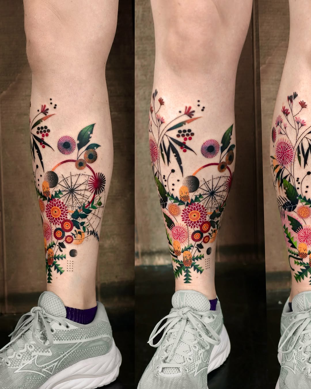 Colorful botanical leg tattoo featuring flowers, dandelion seeds, berries, and green foliage in red, pink, orange, and black on both calves.