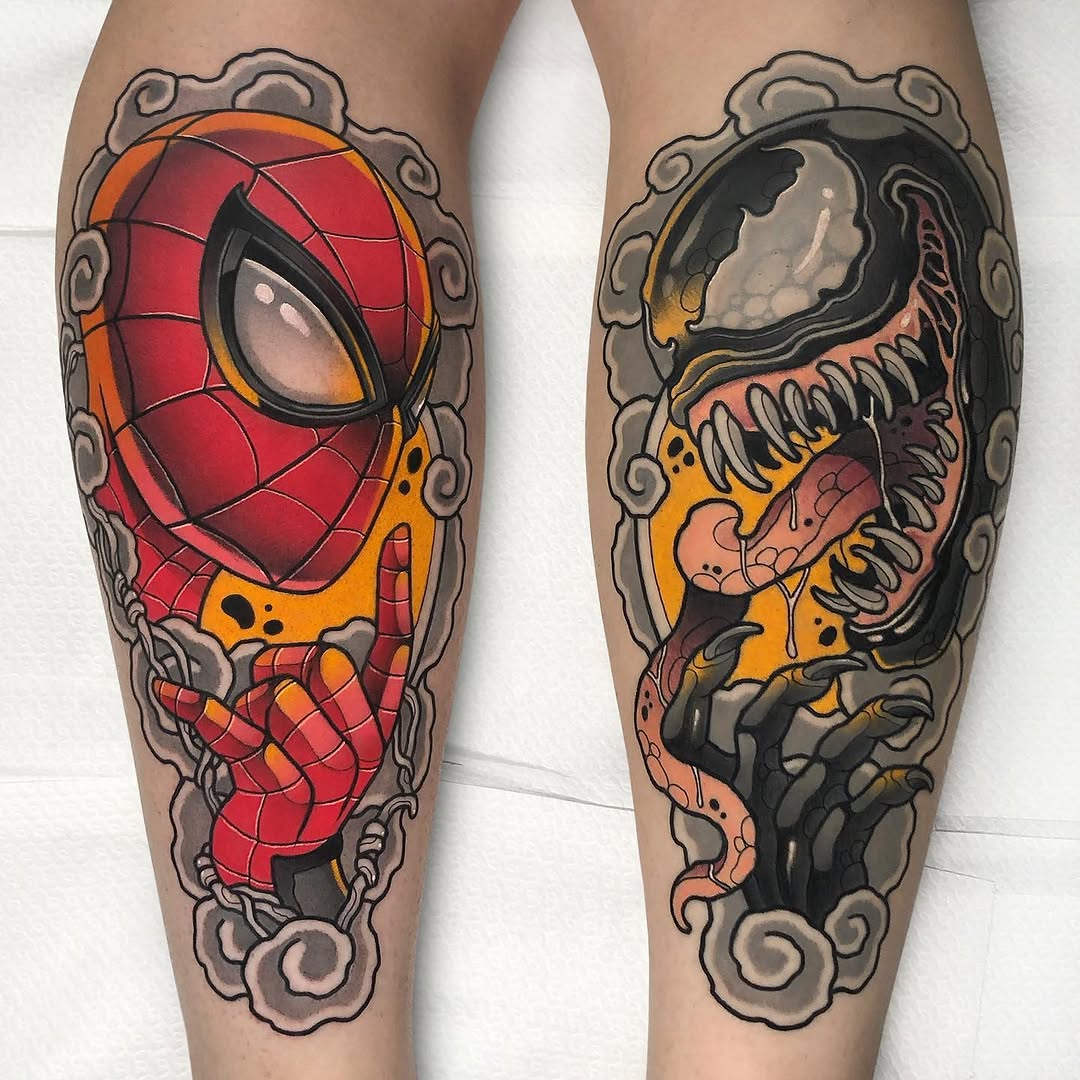 Two leg tattoos featuring Marvel characters Spider-Man and Venom in red, black, orange, and grey with ornamental frames on the calves.