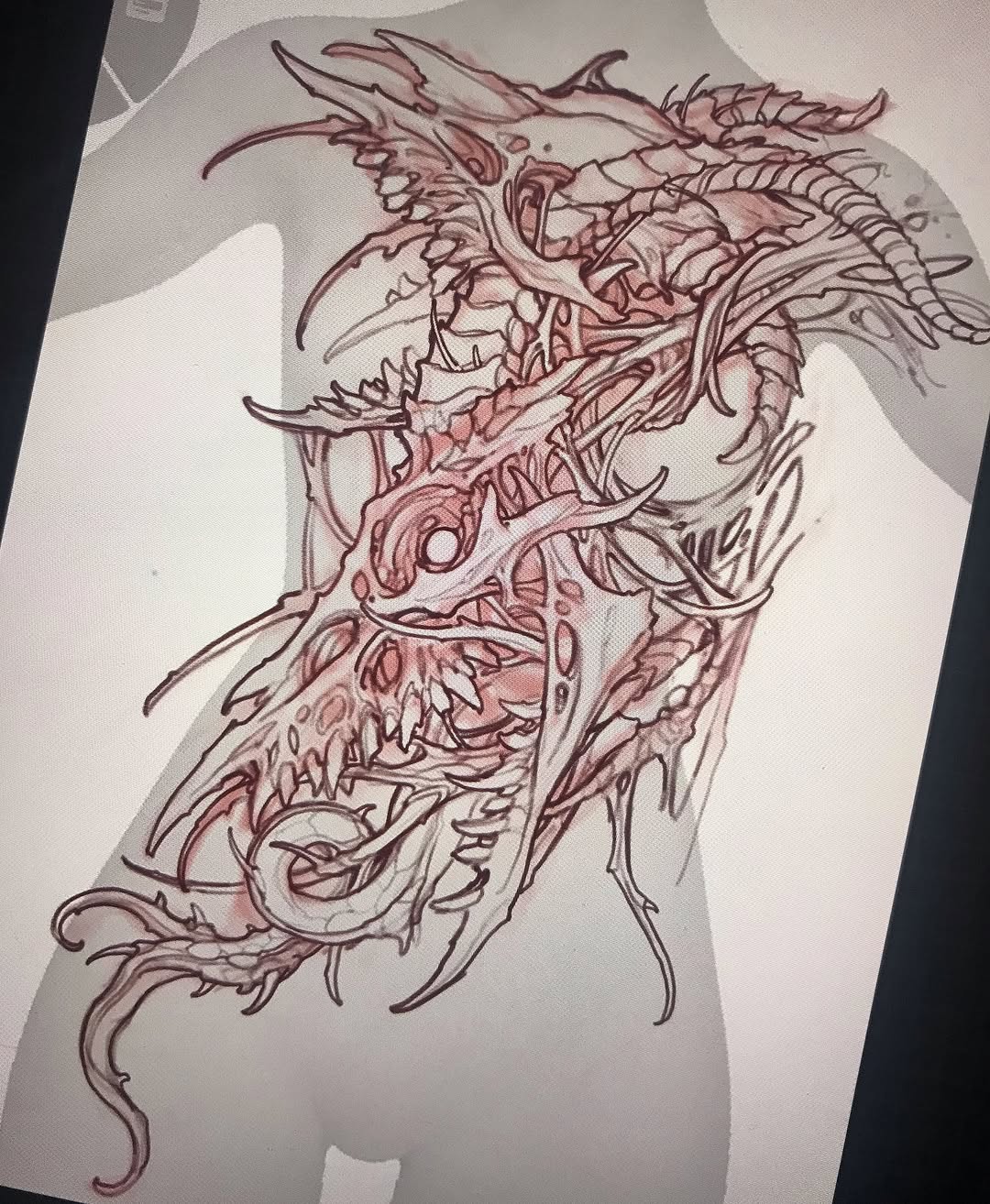 Detailed dragon tattoo design sketch in red and brown ink featuring elaborate horns, scales, and flowing tentacle-like appendages across the upper torso.