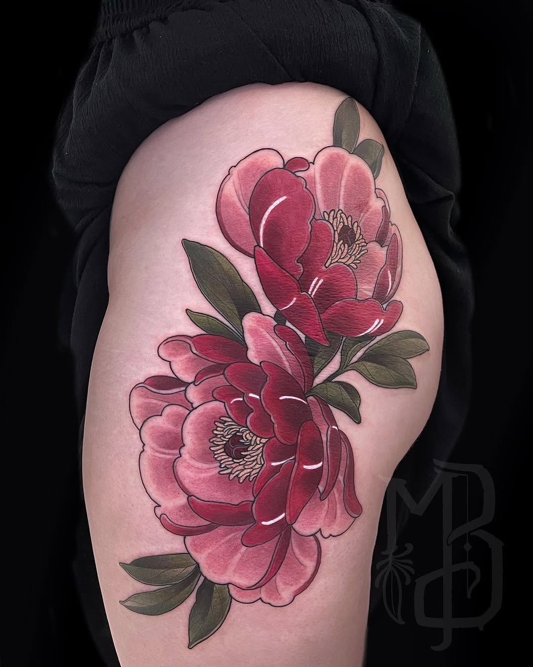 Two red and pink peonies with green leaves and visible stamens tattooed on the upper thigh, featuring white highlight details.