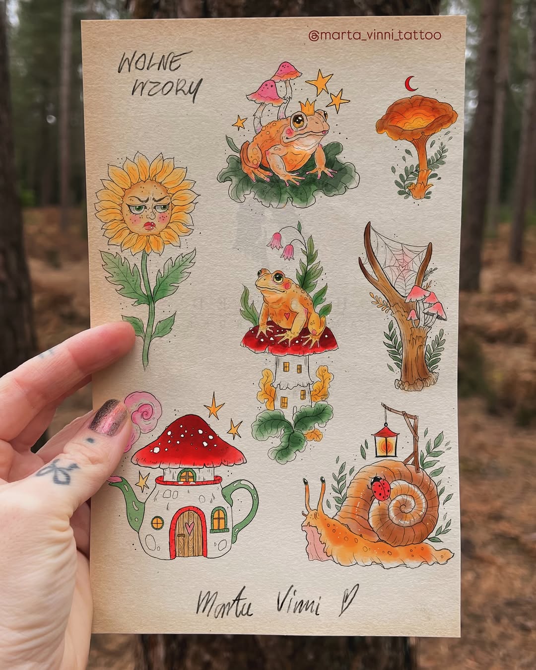 Whimsical woodland design featuring orange frogs, mushroom houses, sunflowers, snails, and magical forest elements in warm watercolor tones on cream paper.