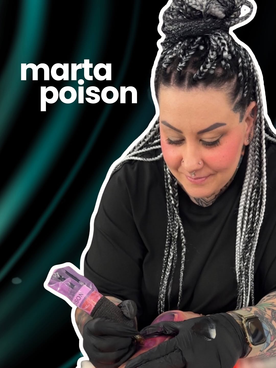 Tattoo artist Marta Poison examines a colorful purple and pink wrist tattoo on a client's arm while wearing black gloves.