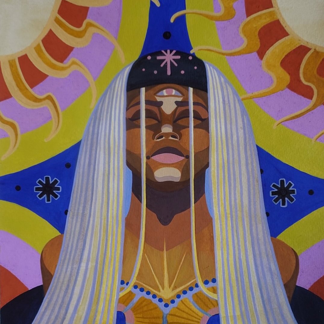 Colorful chest tattoo featuring an Egyptian pharaoh with pale braided hair, dark headdress, facial markings, and gold ornaments against a symmetrical geometric background in blue, yellow, purple, and red.