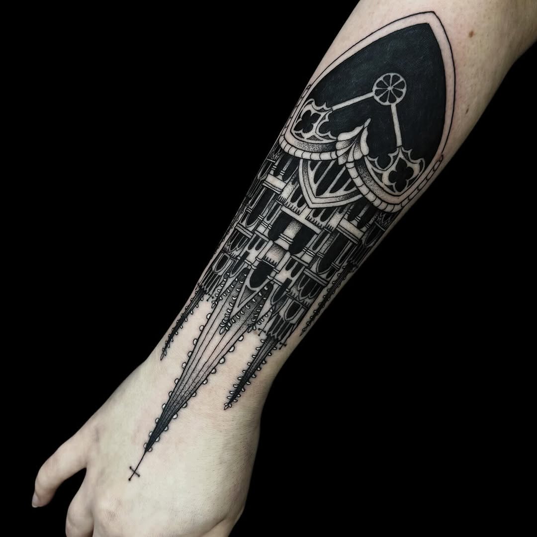 Ornate steampunk airship tattoo with gears and mechanical details on the forearm, rendered in black ink with solid fill and line work.
