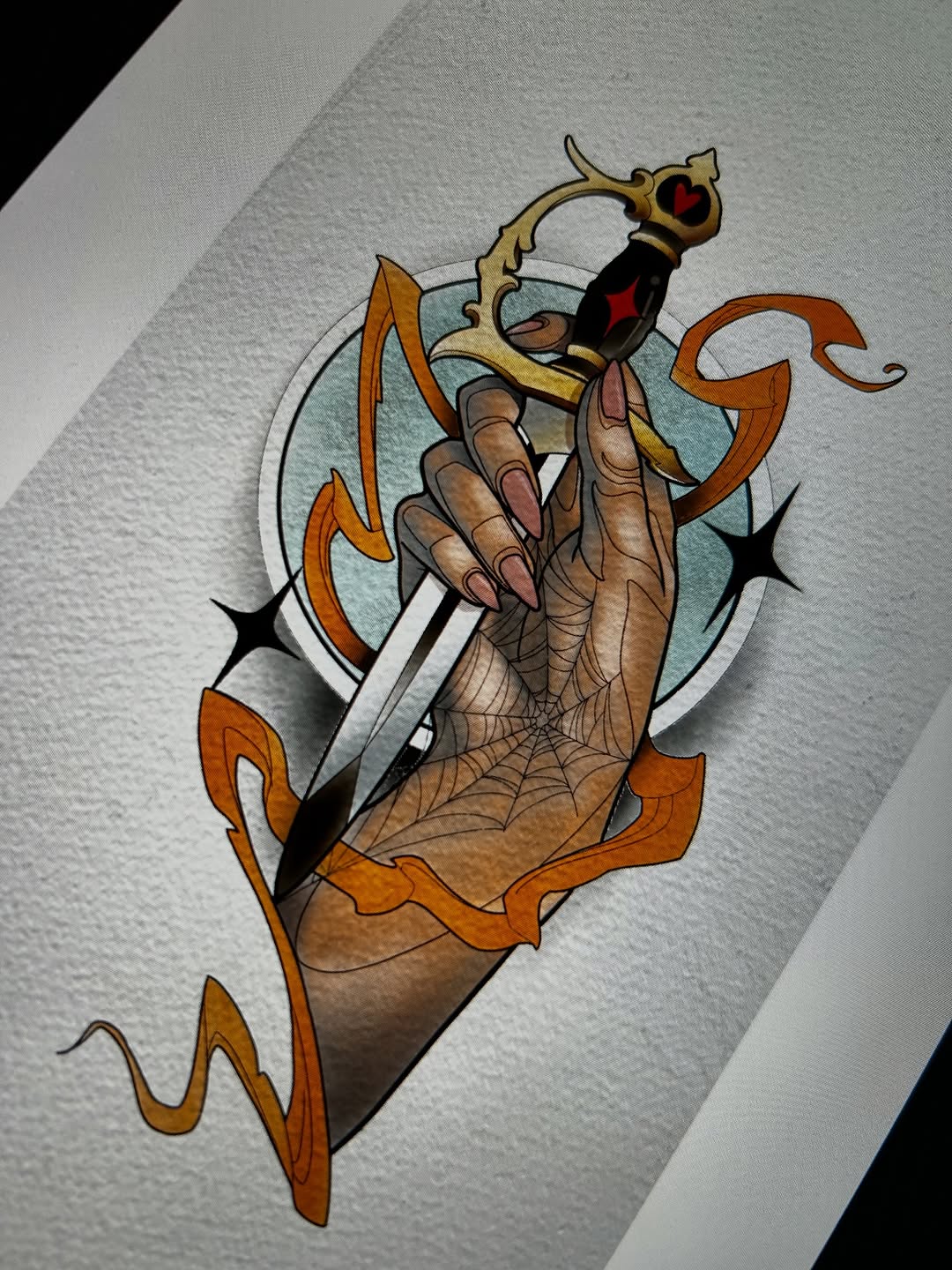 Colored tattoo design featuring an ornate hand holding daggers with web detailing, decorative gold crown, and orange flame elements on light background.