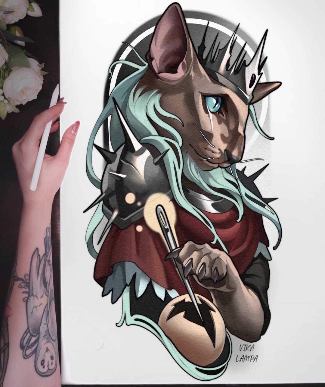Colored shoulder tattoo of a cat-like character with turquoise hair, spiky features, and holding daggers, signed by artist Vika Lampa.