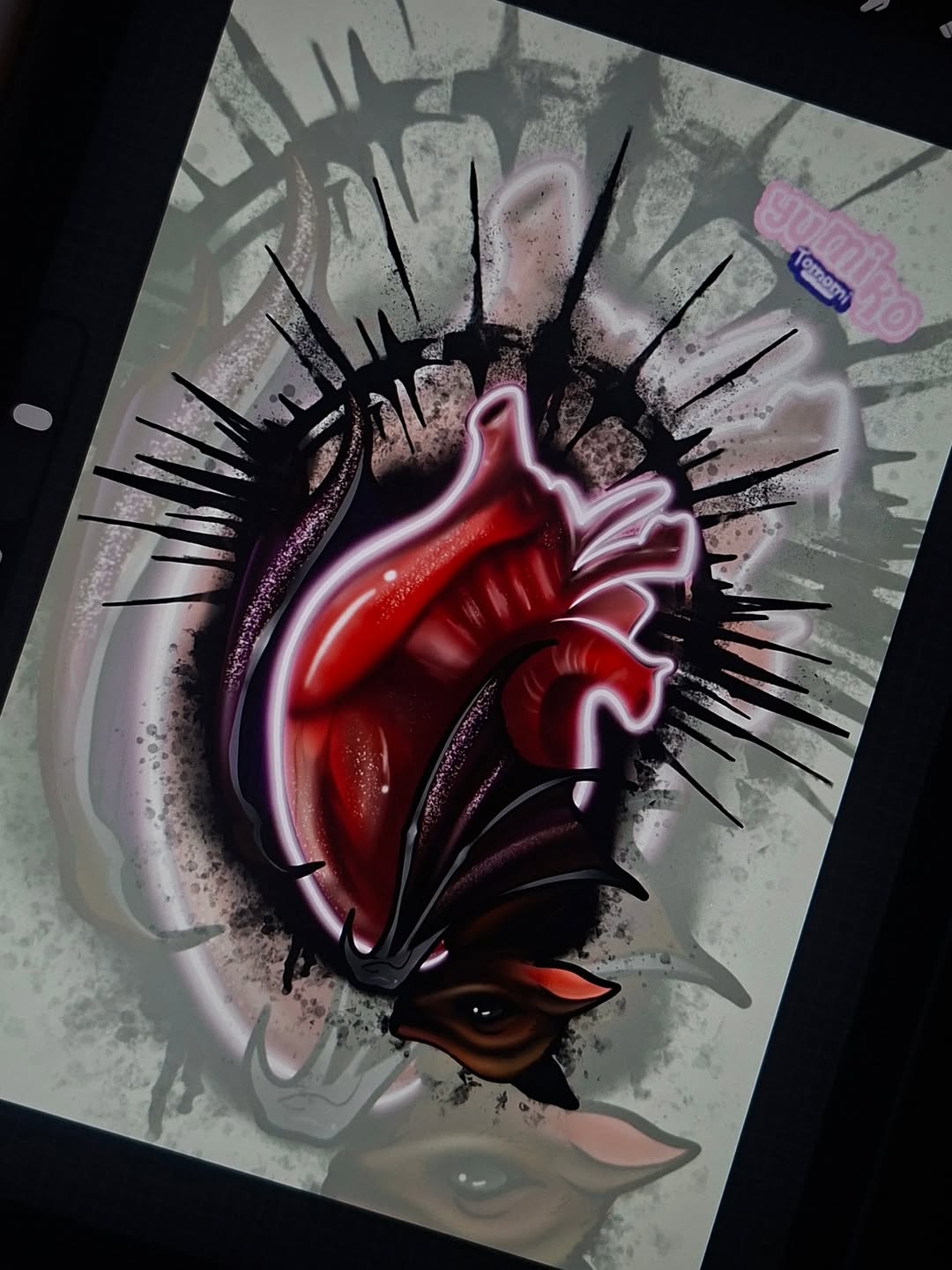 Vibrant red anatomical heart with pink neon outline and black spiky rays on white paper, displayed at an angle.